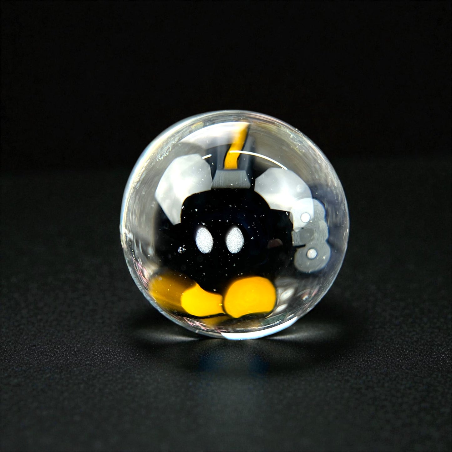 Steven H Glass – Bob-Omb (Super Mario) Millie Valve Marble (12–13mm)